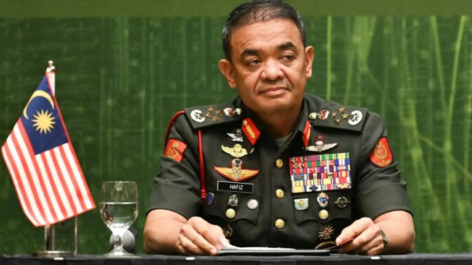 Malaysian Ex-Army Chief, Wife Charged in Corruption Probe