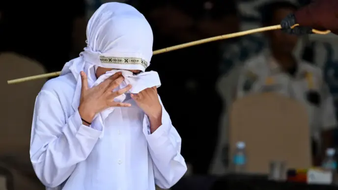 Couple Publicly Flogged for Sex Outside Marriage