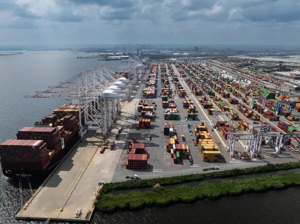 IMF Lifts Growth Forecast, Flags Trade Tensions