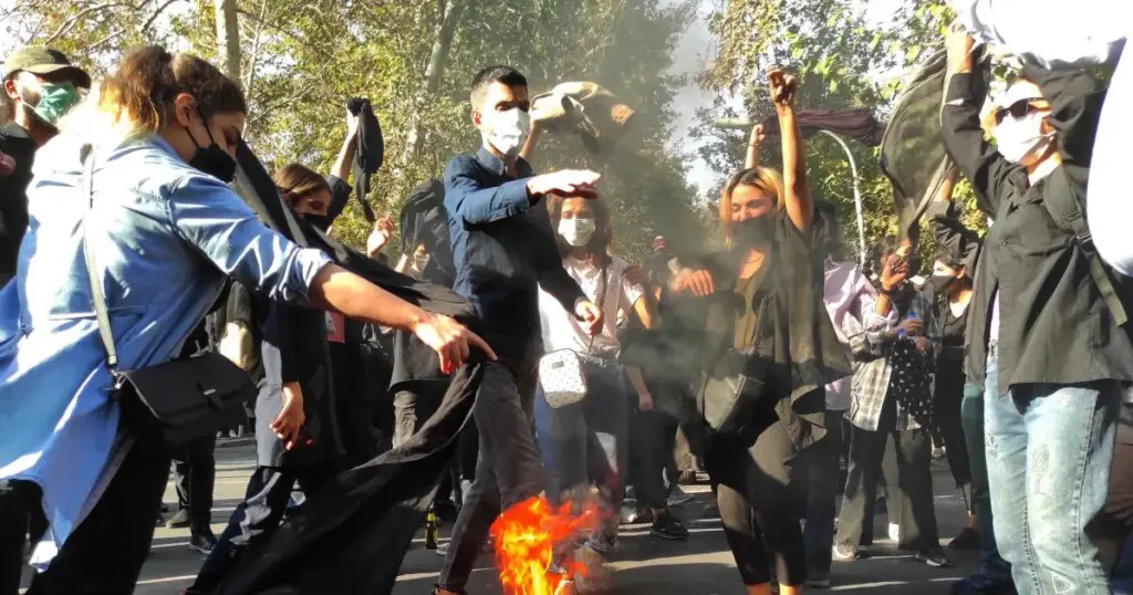 Iran Protests Enter Day 12, Officer Killed
