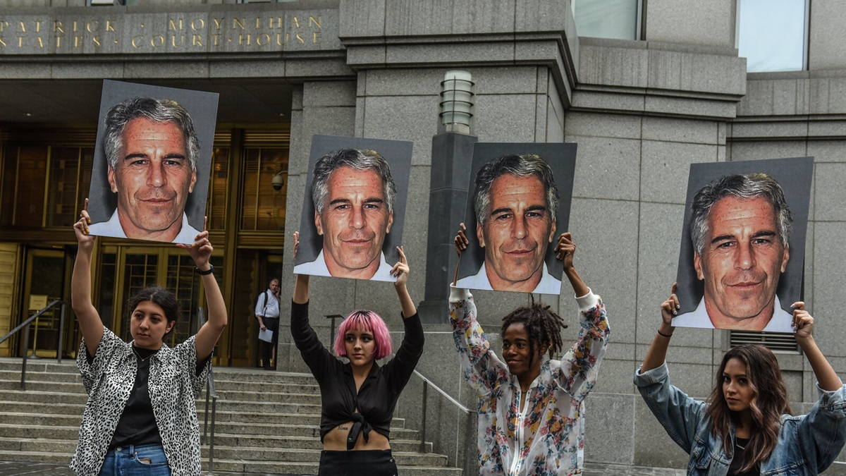A protest group with signs of Jeffrey Epstein in front of the federal courthouse in Manhattan in 2019. 