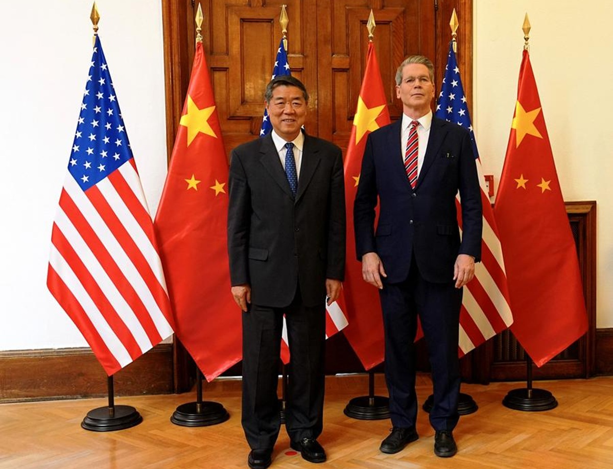 Chinese Vice Premier He Lifeng, also a member of the Political Bureau of the Communist Party of China Central Committee, poses for a photo with U.S. Treasury Secretary Scott Bessent prior to their talks in Madrid, Spain, Sept. 14, 2025. 