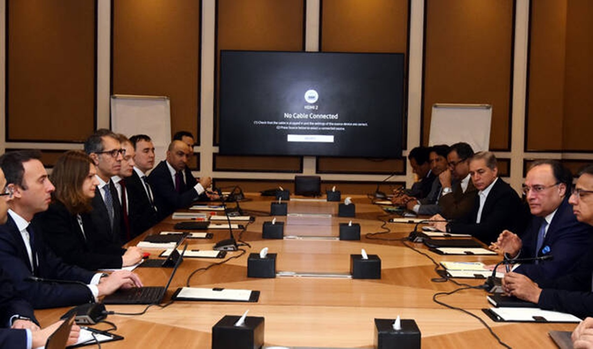 Pakistan’s delegation (right) meets with a visiting International Monetary Fund (IMF) team (left) for formal talks in Islamabad, Pakistan. 