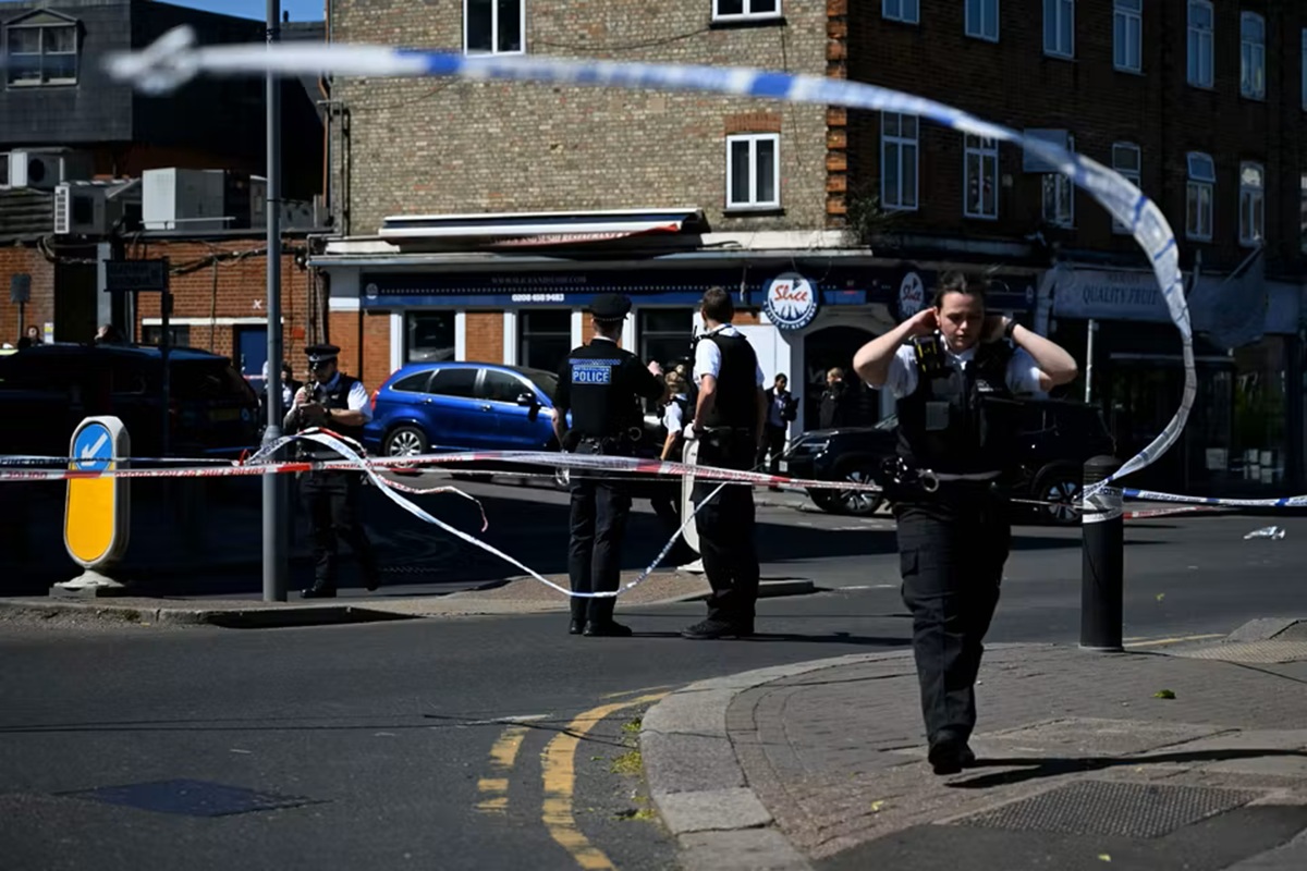 Police investigate a cordoned-off area in the Golders Green neighborhood of north London on April 29, 2026, following the stabbing of two people nearby.