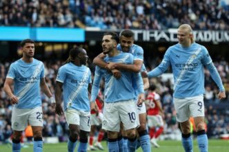 City Edge Arsenal to Control Title Race