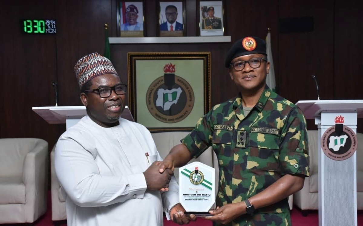 Joash Amupitan, the INEC chairman, and Olakunle Nafiu, director-general of the NYSC
