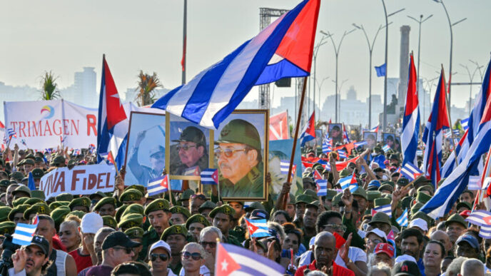 Castro Supporters Rally Outside US Embassy (NewsCentral TV)