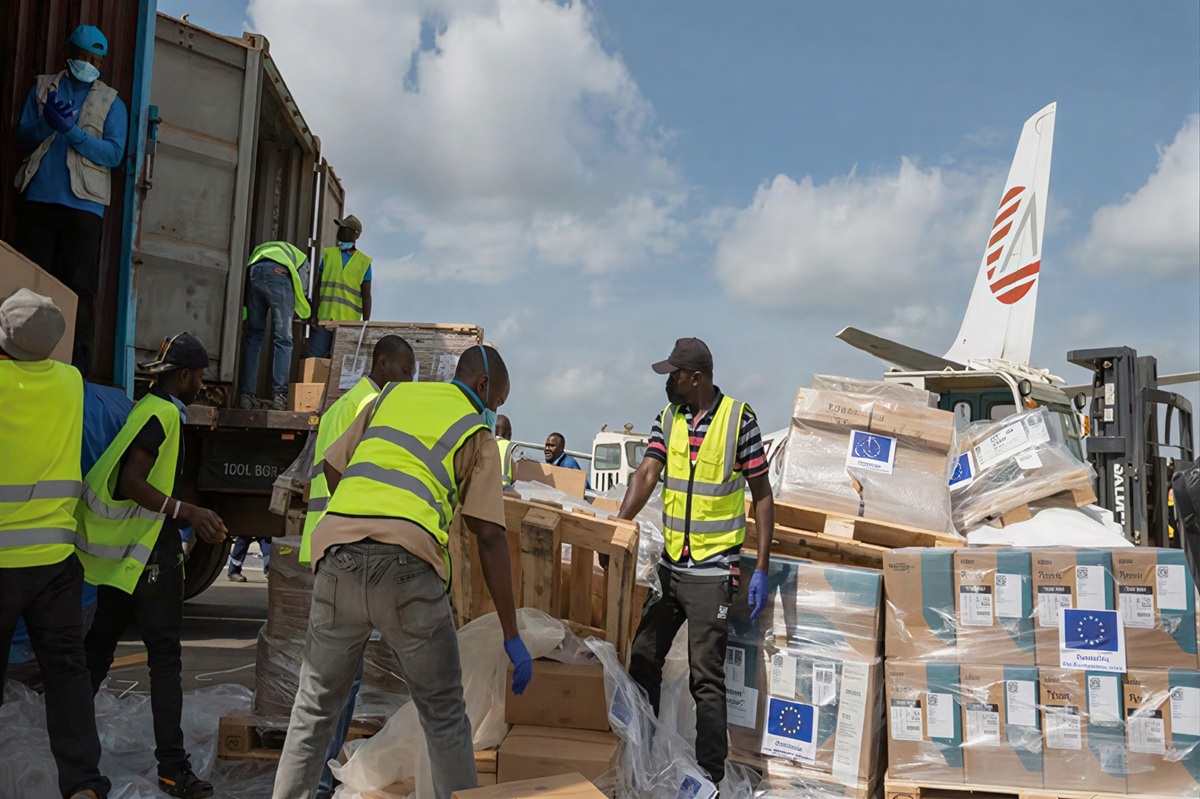 Workers offload medical and emergency supplies donated by European Union to support frontline workers in fighting Ebola upon arrival at the national airport in Bunia, Congo. AP