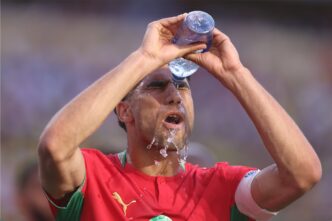 soccer-player-pouring-H2O-on-face-resized