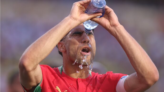 soccer-player-pouring-H2O-on-face-resized