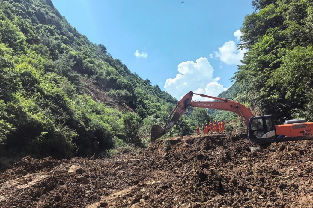 Rescuers work at the site of a landslide that took place at a village in Nanhe township of Tanchang county, Longnan city, Northwest China's Gansu province, July 7, 2026.
