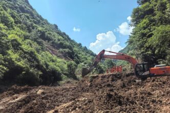 Rescuers work at the site of a landslide that took place at a village in Nanhe township of Tanchang county, Longnan city, Northwest China's Gansu province, July 7, 2026.