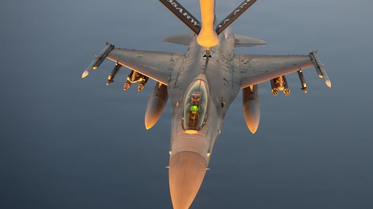 A US Air Force F-16 fighter jet refuels during a patrol over the Middle East, pictured in an image shared by US Central Command on July 12, 2026.