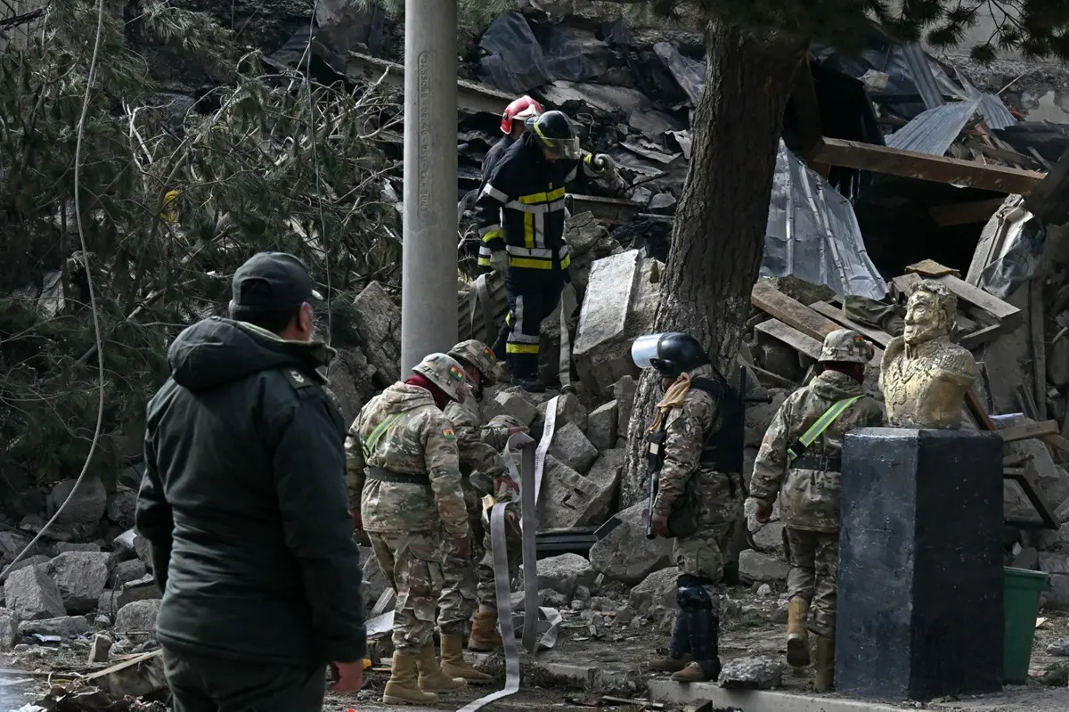 Military personnel and firefighters check damages following an explosion at an army barracks on the eve, in Viacha, Bolivia, on September 5, 2026.