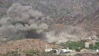 This screen grab taken from undated video footage released on September 12, 2026 by Ansarullah Media Centre purportedly shows smoke rising in the distance as fighting continues between Houthi fighters and Saudi-backed forces.