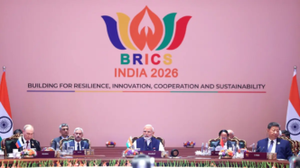 This handout photograph taken and released by Indian Press Information Bureau (PIB) on September 13, 2026 shows Russia's President Vladimir Putin (L), India's Prime Minister Narendra Modi (C) and China's President Xi Jinping (R) attending the 18th BRICS Summit in New Delhi.