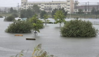 Typhoon Dujuan Disrupts Flights, Forces Evacuations in Japan
