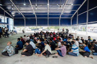 Rohingya refugees are seen at the Kuala Lumpur Police Headquarters after being relocated from outside the UNHCR office in Jalan Bukit Petaling on July 28, 2026, ahead of their repatriation to Myanmar, from where they originally fled.