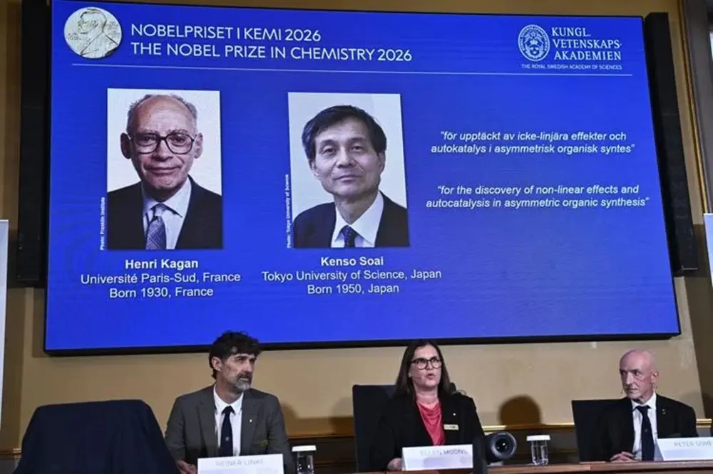 Portraits of Henri Kagan and Kenso Soai are shown on the screen as they are awarded the 2026 Nobel Prize in Chemistry, at the Royal Swedish Academy of Sciences inStockholm, Sweden, on Oct. 7, 2026. 
