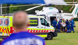 Paramedics prepare to transport the injured by helicopter