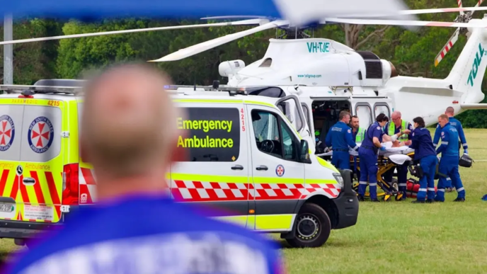 Paramedics prepare to transport the injured by helicopter