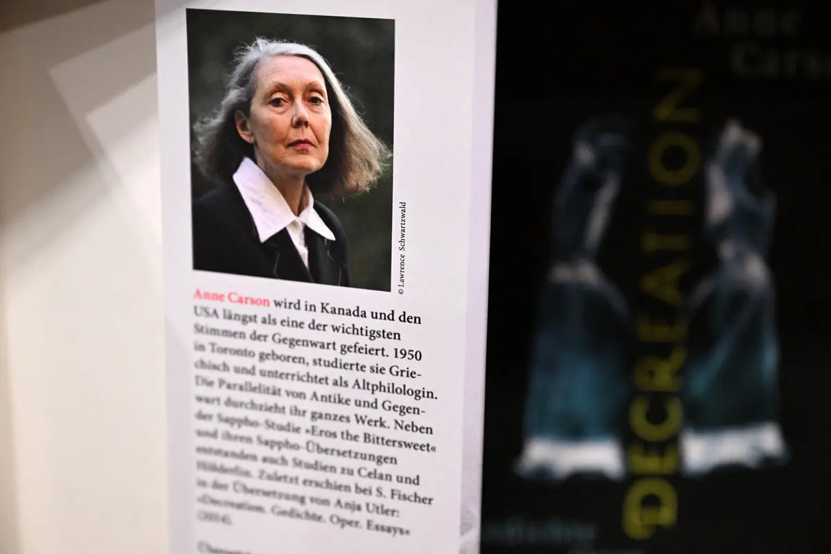 A book of 2026 Nobel Prize in Literature laureate Canadian writer Anne Carson is on display at the S. Fischer publishing house's booth at the 78th Frankfurt book fair, the world's biggest trade fair for books, in Frankfurt am Main, western Germany on October 8, 2026.