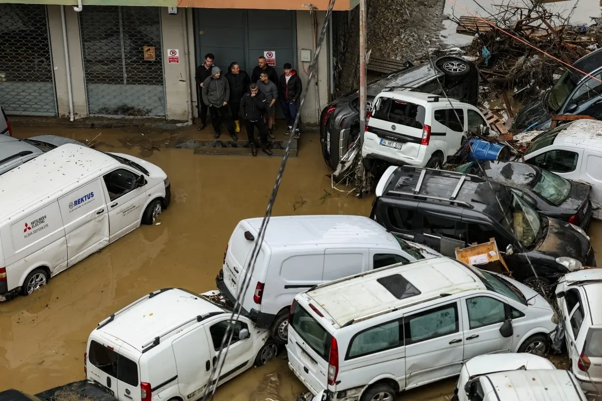 Car owners search for their vehicles swept away by the flood after heavy rain at Ayazaga district in Istanbul on October 15, 2026.