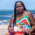 Rita Cassia, the mother of Carlos Alberto, who she alleges was killed by Bahia's Military Police during a police operation in the Nordeste de Amaralina complex in 2013, poses for a portrait with photographs of her son in Salvador, Bahia state, Brazil, on September 12, 2026