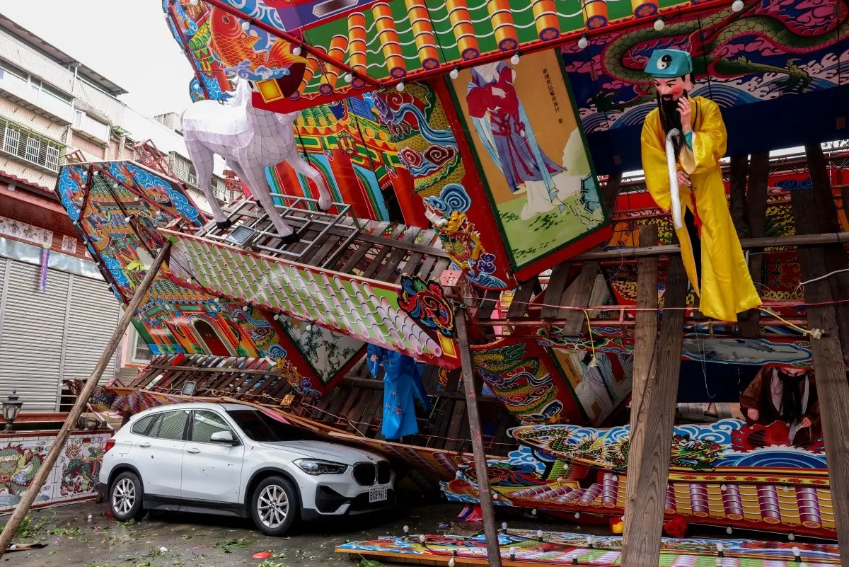A temporary structure built for a traditional Taoist religious ceremony lies collapsed due to strong winds from Typhoon Champi in Keelung on October 24, 2026.