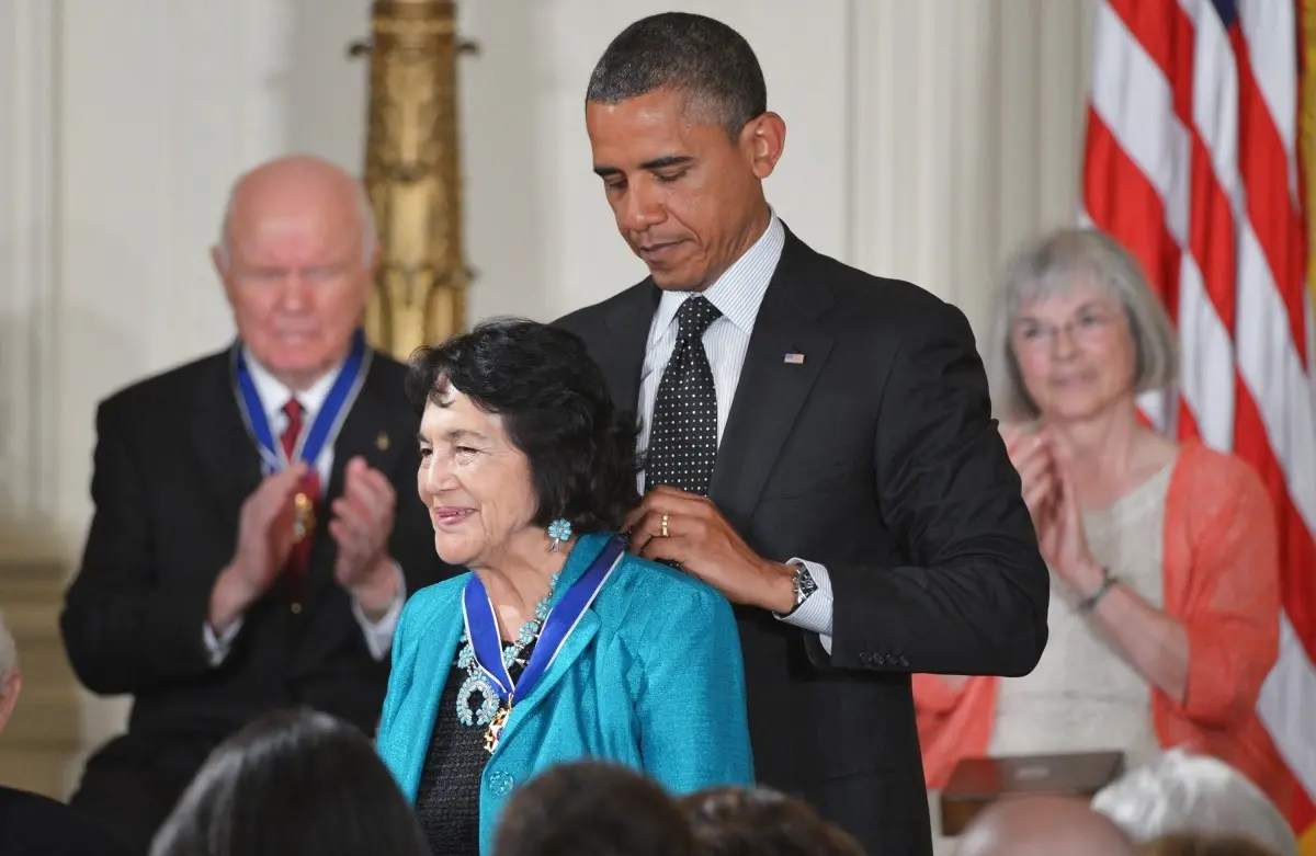 US President Barack Obama presents the Presidential Medal of Freedom to rights activist Dolores Huerta during a ceremony on May 29, 2012 in the East Room of the White House in Washington.