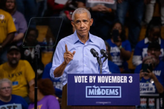 FormerPresidentBarackObamaCampaignsAlongsideMich