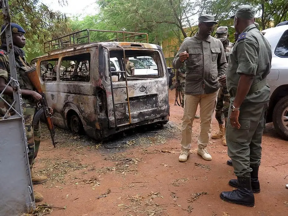 Malian soldiers survey the damage after the August 7-8, 2015 attack by gunmen in Sévaré, a garrison town 600 kilometers northeast of Bamako, the capital. 