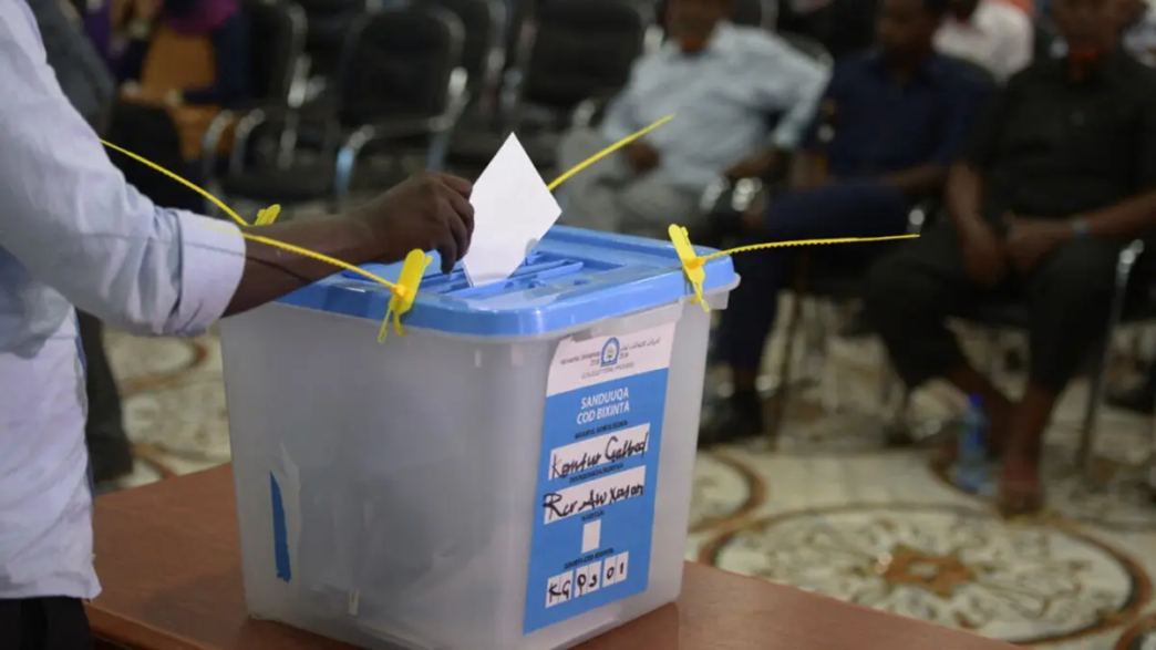A person casts her ballot on November 16, 2016, in Baidoa, southern Somalia