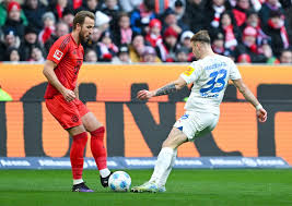 Bayern Hold On to Beat Kiel 4-3 and Go Nine Points Clear
