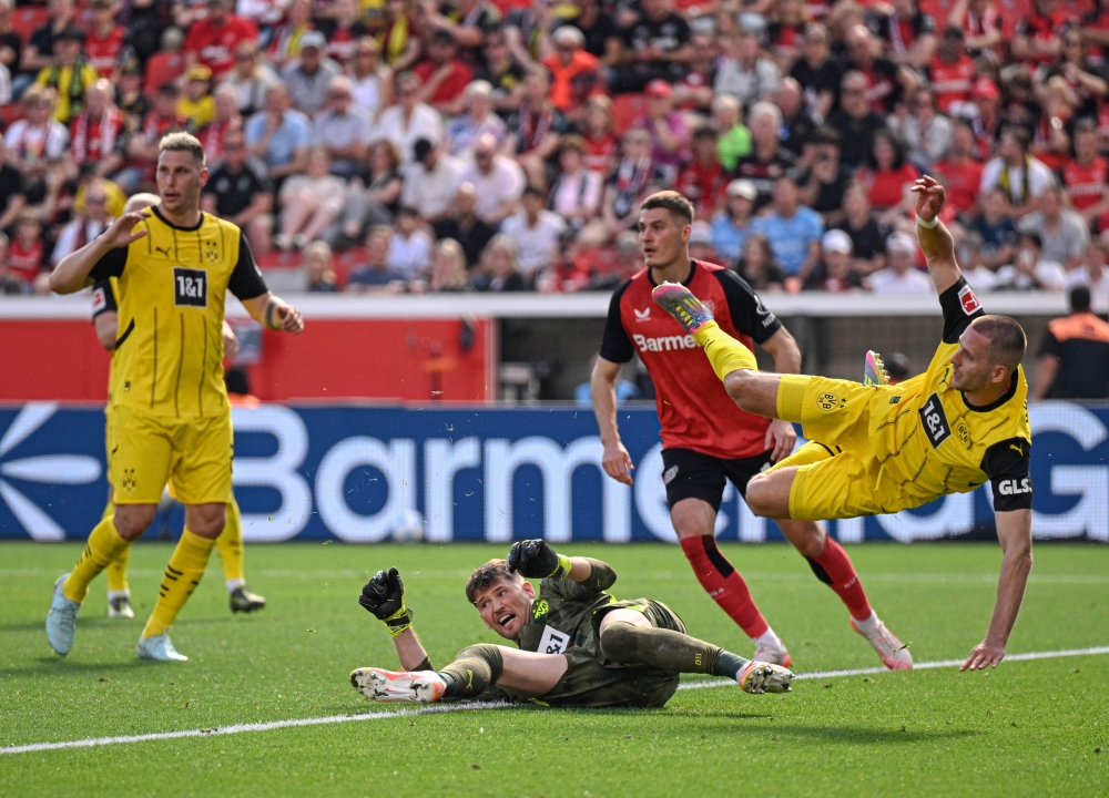 Dortmund Hammer Leverkusen to Dent Alonso's Emotional Send-Off